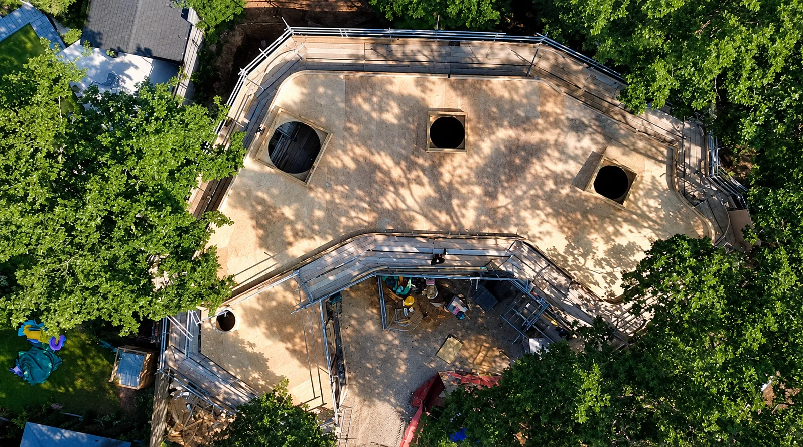 Timber roof structure under construction